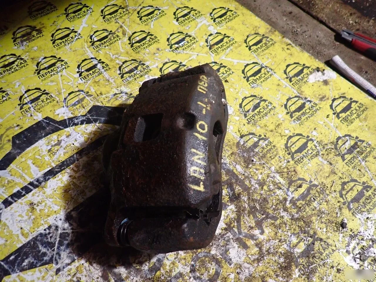 Суппорт передний левый Mitsubishi Lancer X