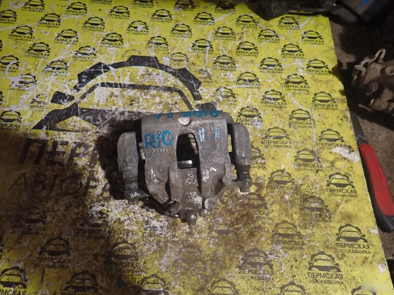 Суппорт тормозной передний левый Kia RIO 2011-2017