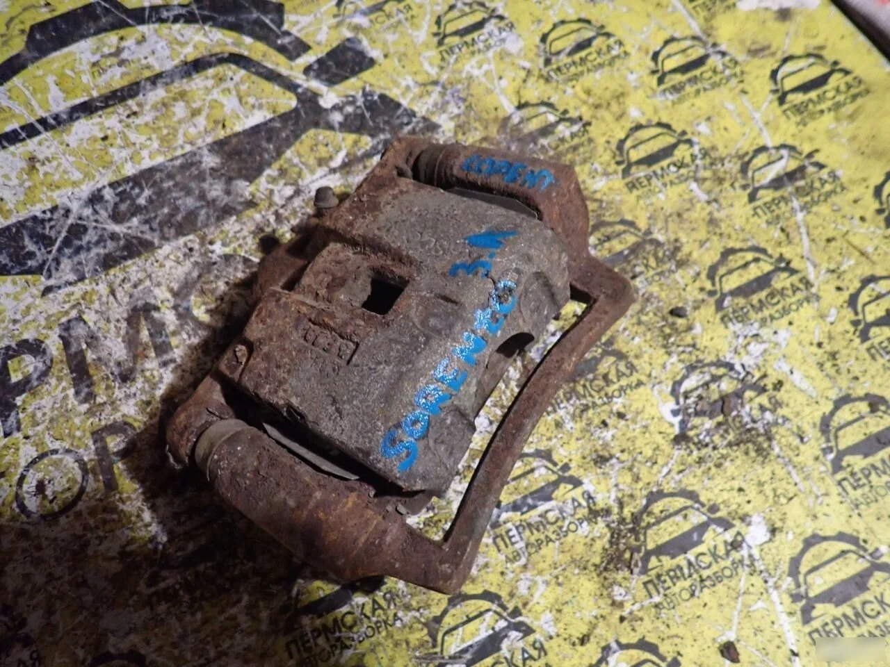 Суппорт тормозной задний левый для Kia Sorento 1