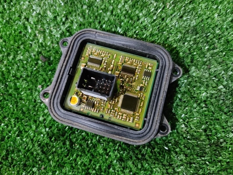 Блок управления адаптивными фарами BMW E71