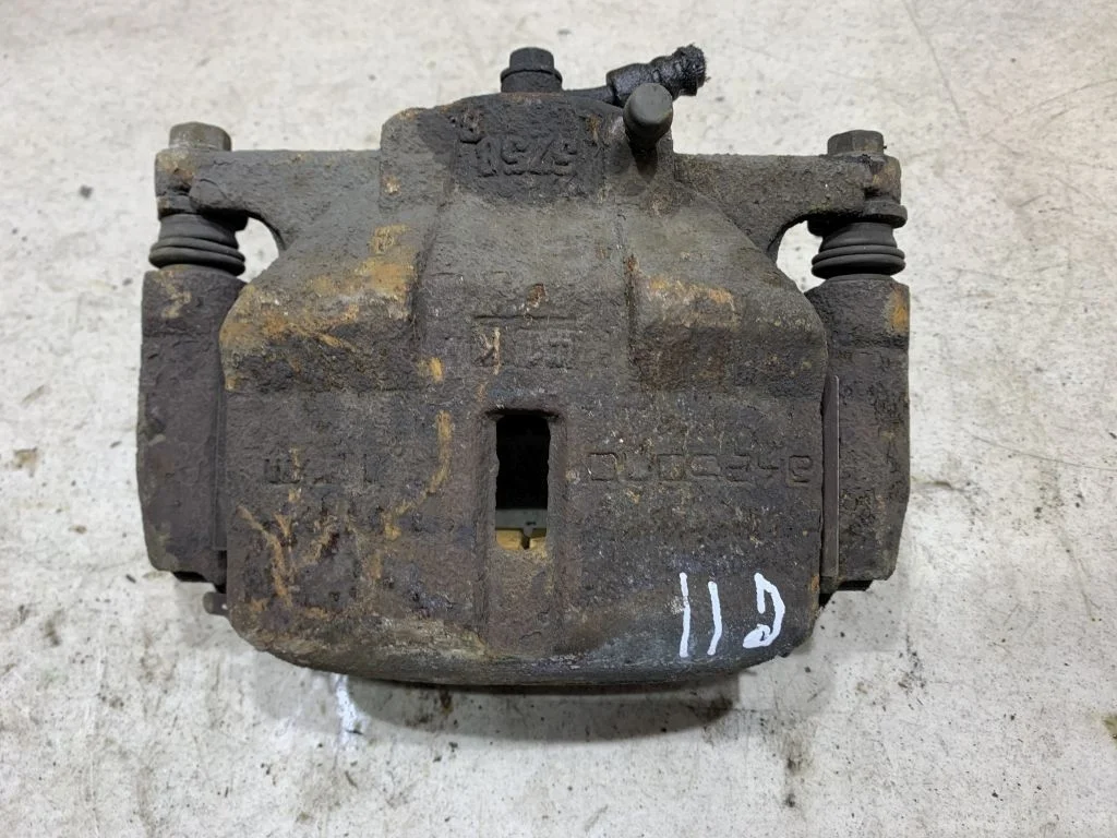 Суппорт левый Nissan Qashqai J11