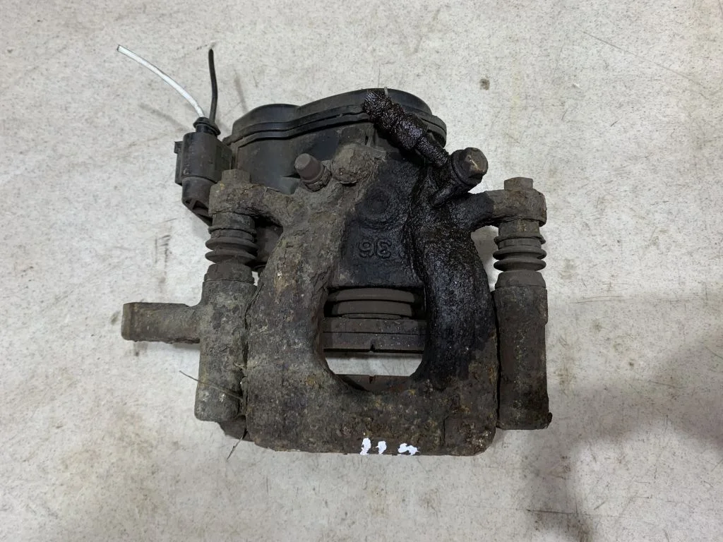 Суппорт задний левый Nissan Qashqai J11, X-Trail T32