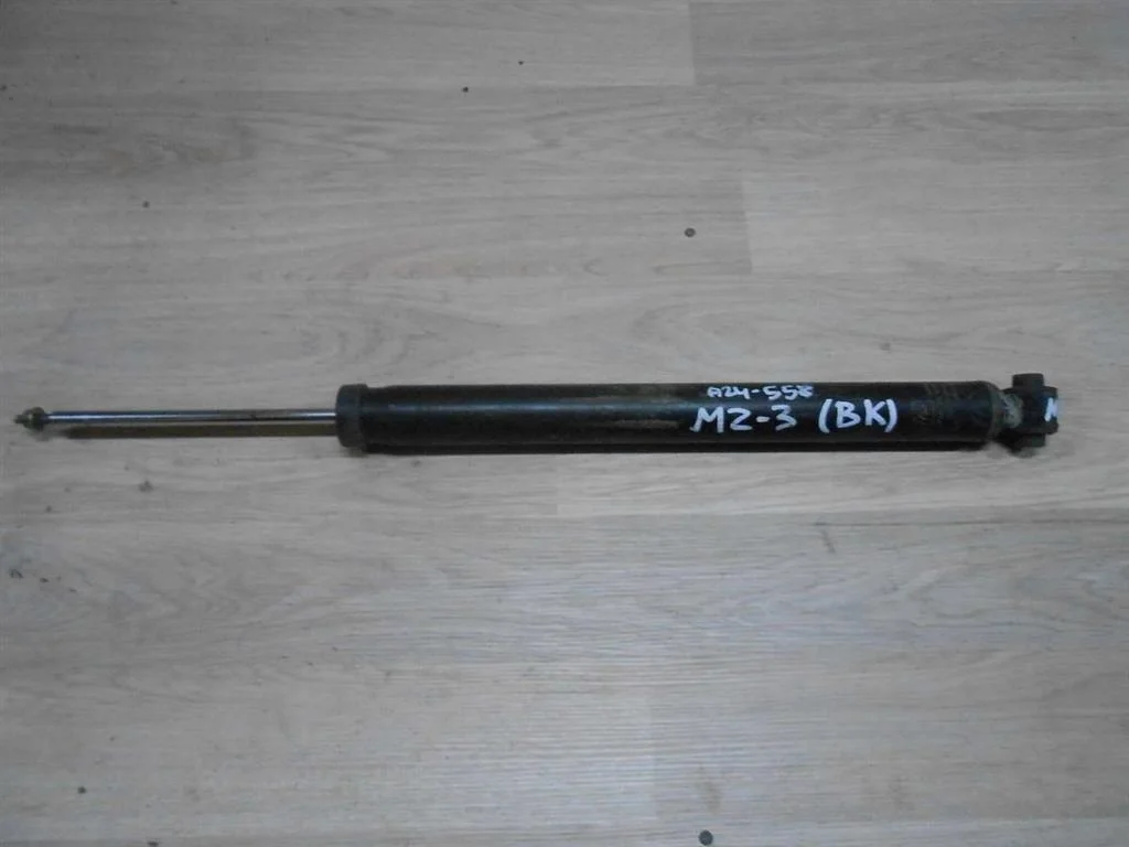 Амортизатор задний Mazda 3 BK (2003—2006)