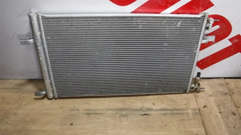 Радиатор кондиционера (конденсер) Opel Astra J (2009—2012)