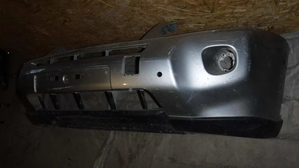 Бампер передний Nissan X-Trail II (2007—2011)