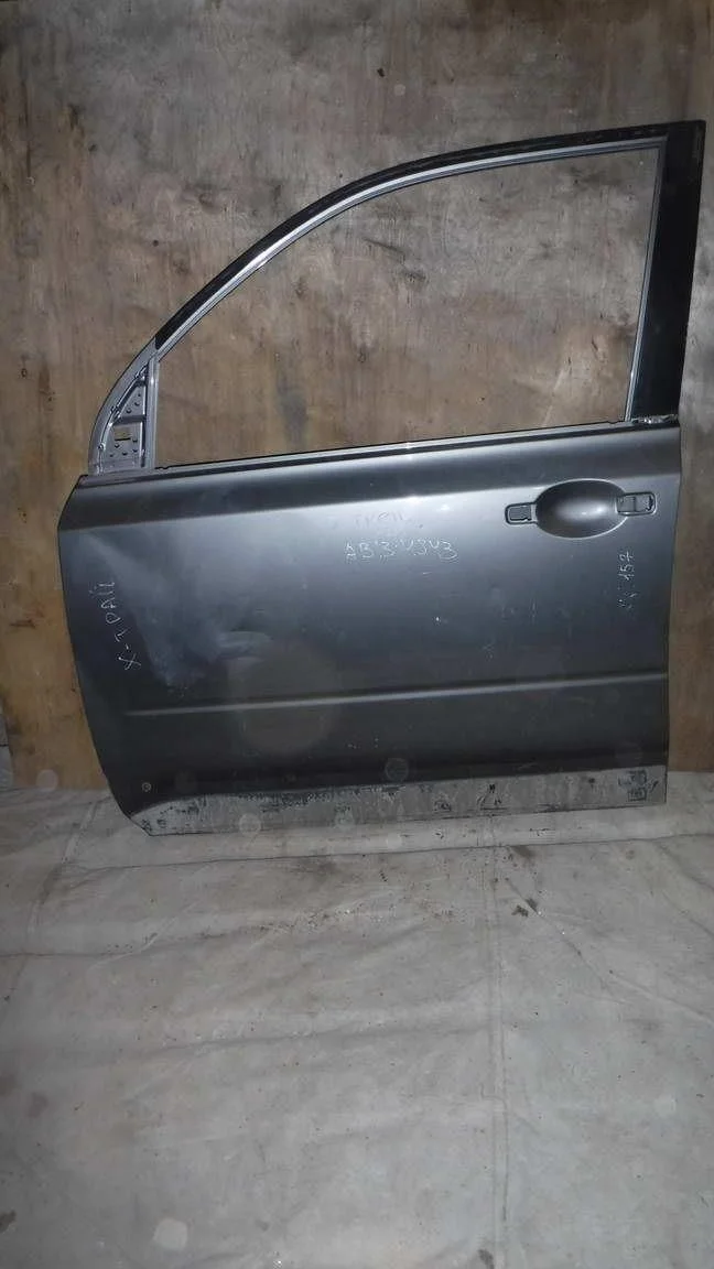 Дверь передняя левая Nissan X-Trail II (2007—2011)