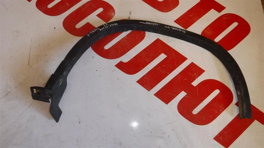 Накладка заднего крыла левого Nissan X-Trail II (2007—2011)