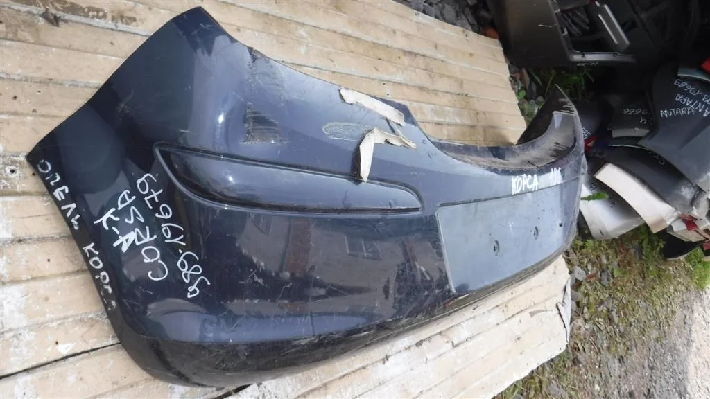 Бампер задний Opel Corsa D (2006—2010)