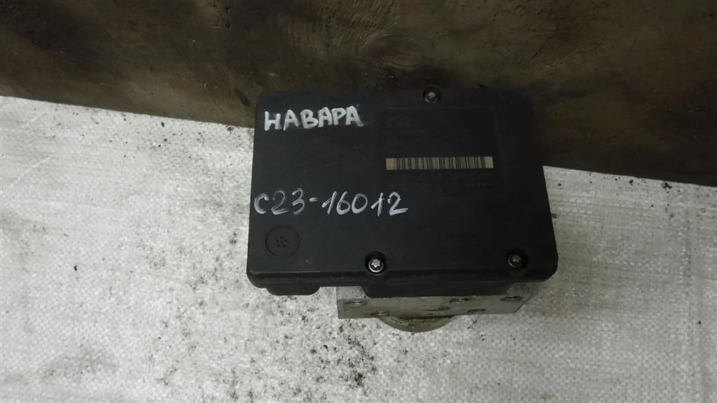 Блок ABS (насос) Nissan Navara D40 (2004—2010)