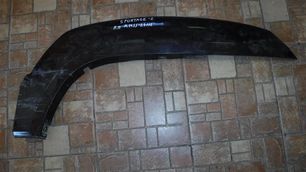 Накладка переднего крыла правого KIA Sportage II (2004—2008)