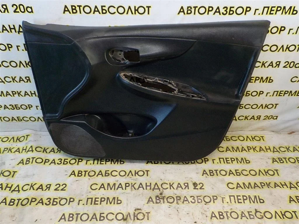 Обшивка двери передней правой Toyota Corolla X (2006—2010)