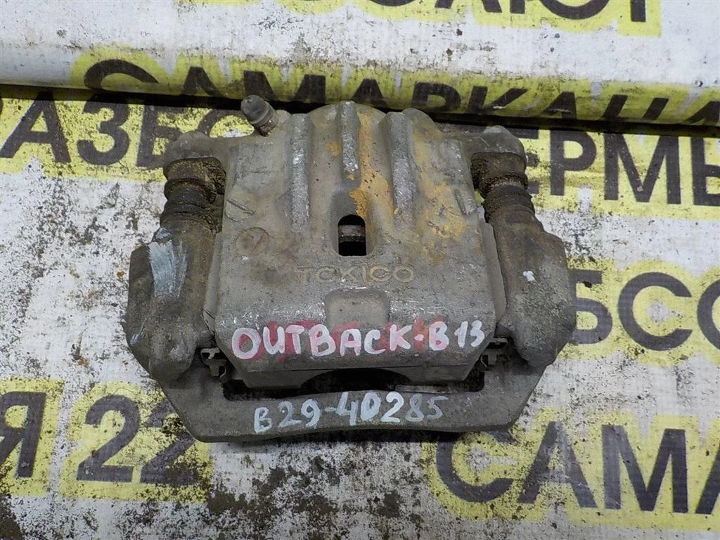 Суппорт задний левый Subaru Outback