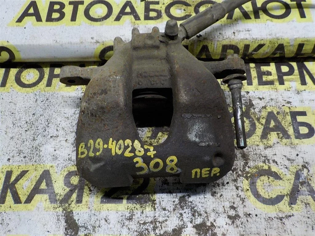 Суппорт передний левый Peugeot 308 I (2007—2011)