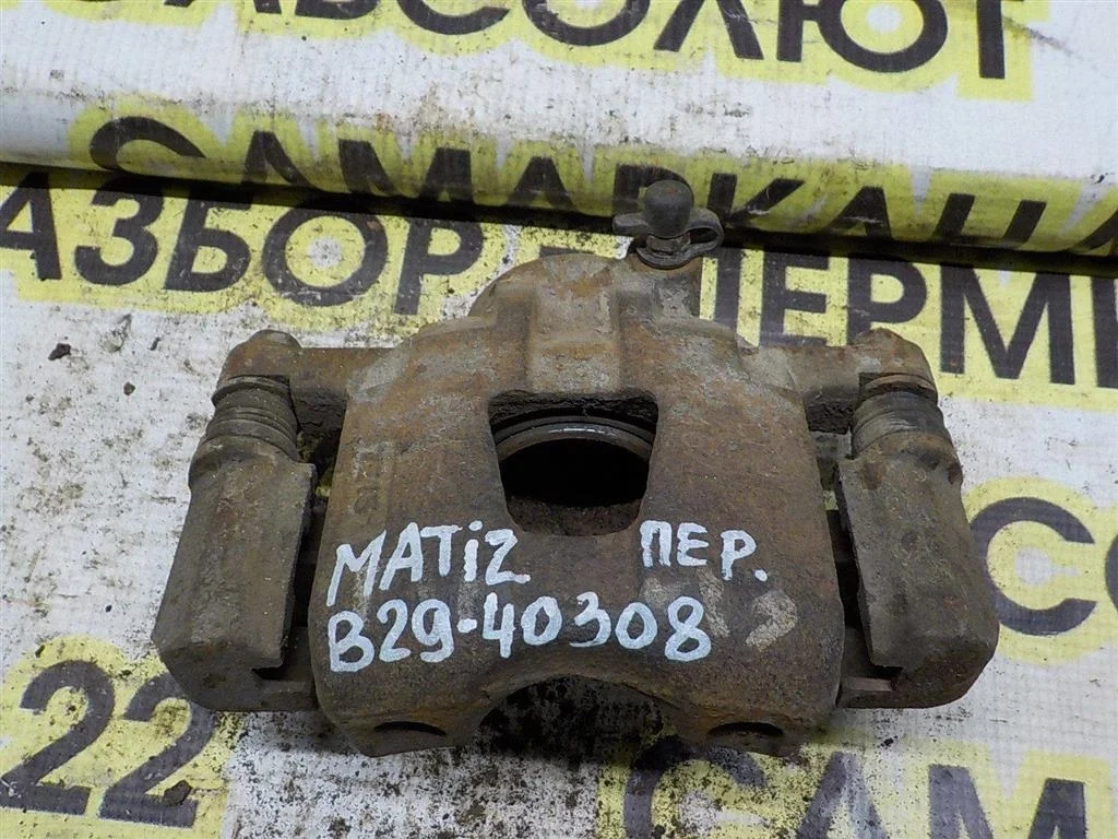 Суппорт передний левый Daewoo Matiz I рестайлинг (2000—2015)