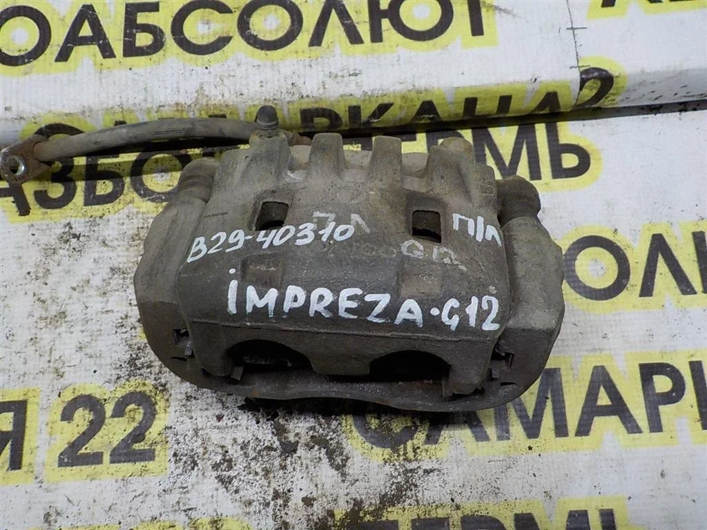 Суппорт передний левый Subaru Impreza GH (2007—2011)