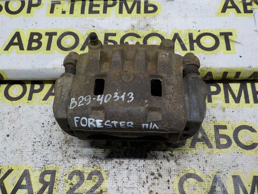 Суппорт передний левый Subaru Forester SH (2007—2011)