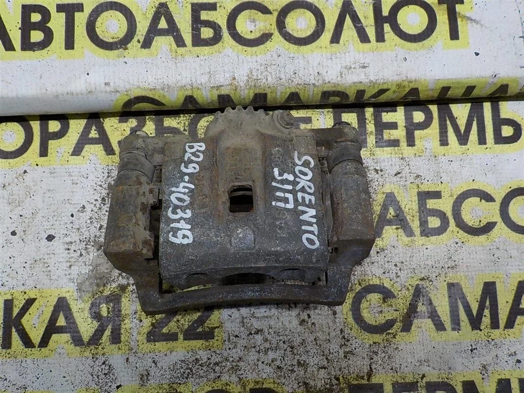 Суппорт задний правый KIA Sorento I (2002—2006)