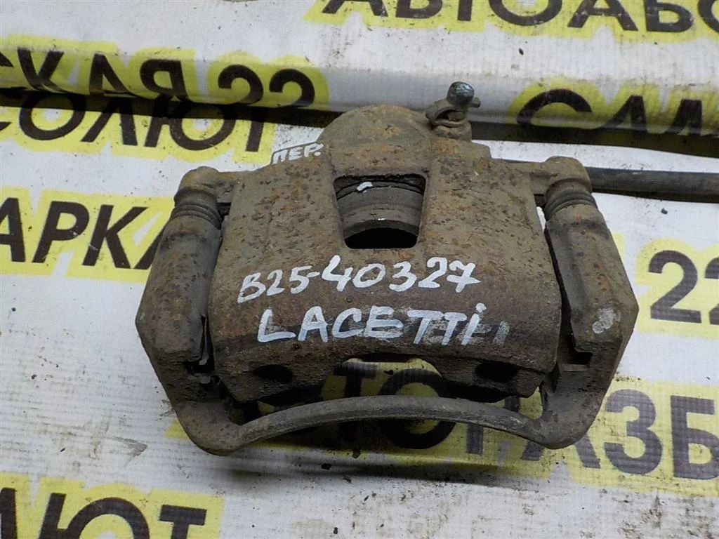 Суппорт передний левый Chevrolet Lacetti I (2004—2013)