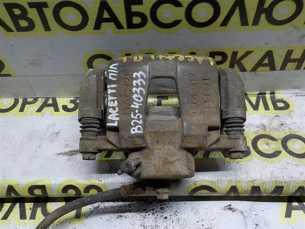 Суппорт передний левый Chevrolet Lacetti I (2004—2013)