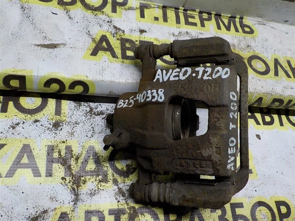 Суппорт передний правый Chevrolet Aveo I (2003—2008)