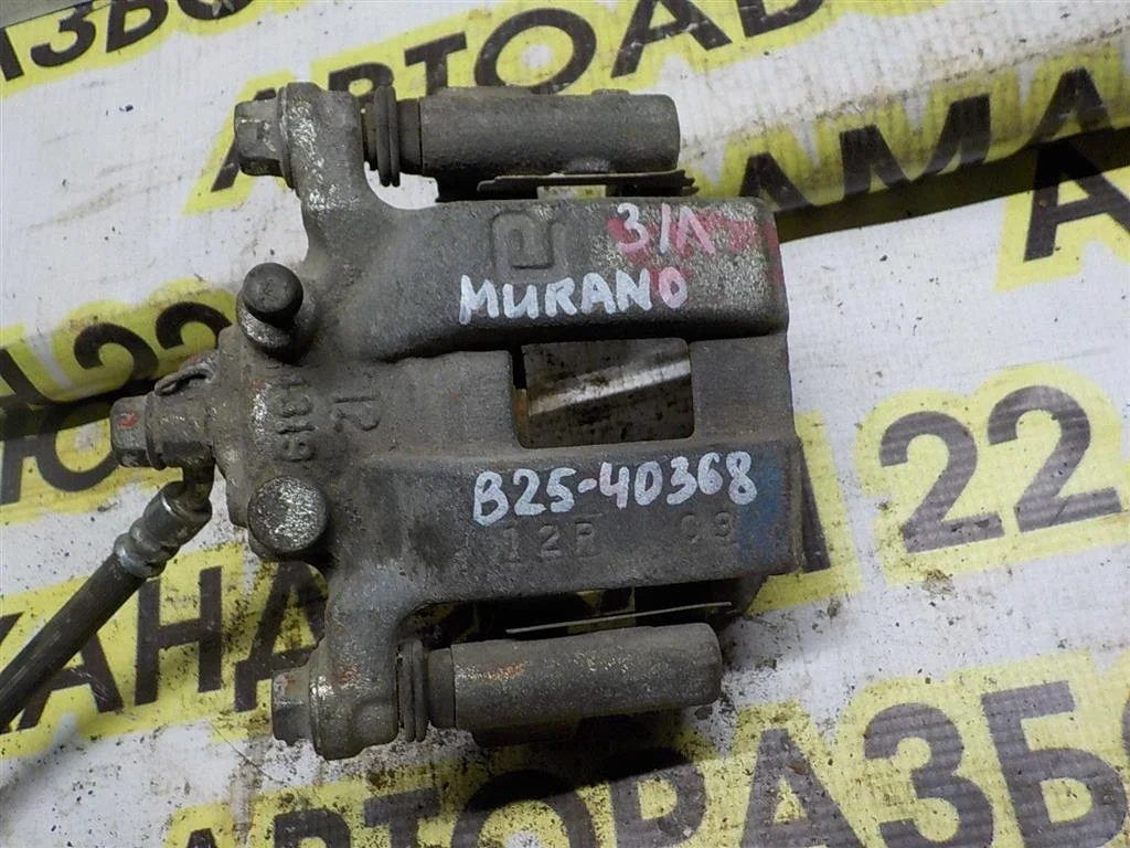 Суппорт задний левый Nissan Murano Z50 (2002—2008)