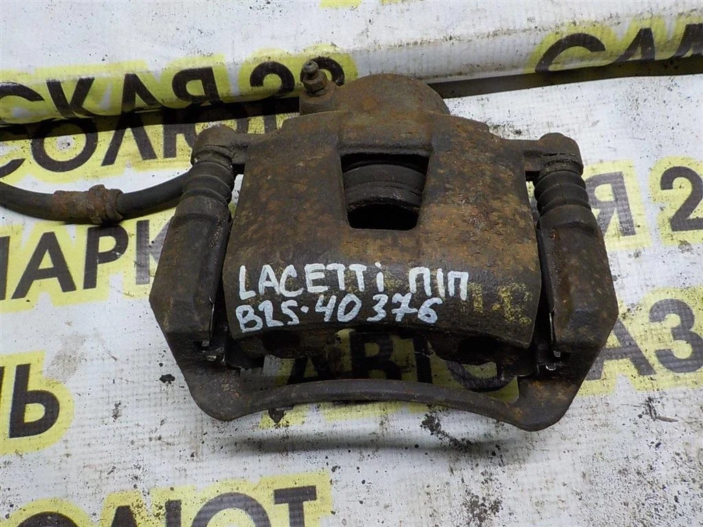 Суппорт передний правый Chevrolet Lacetti I (2004—2013)