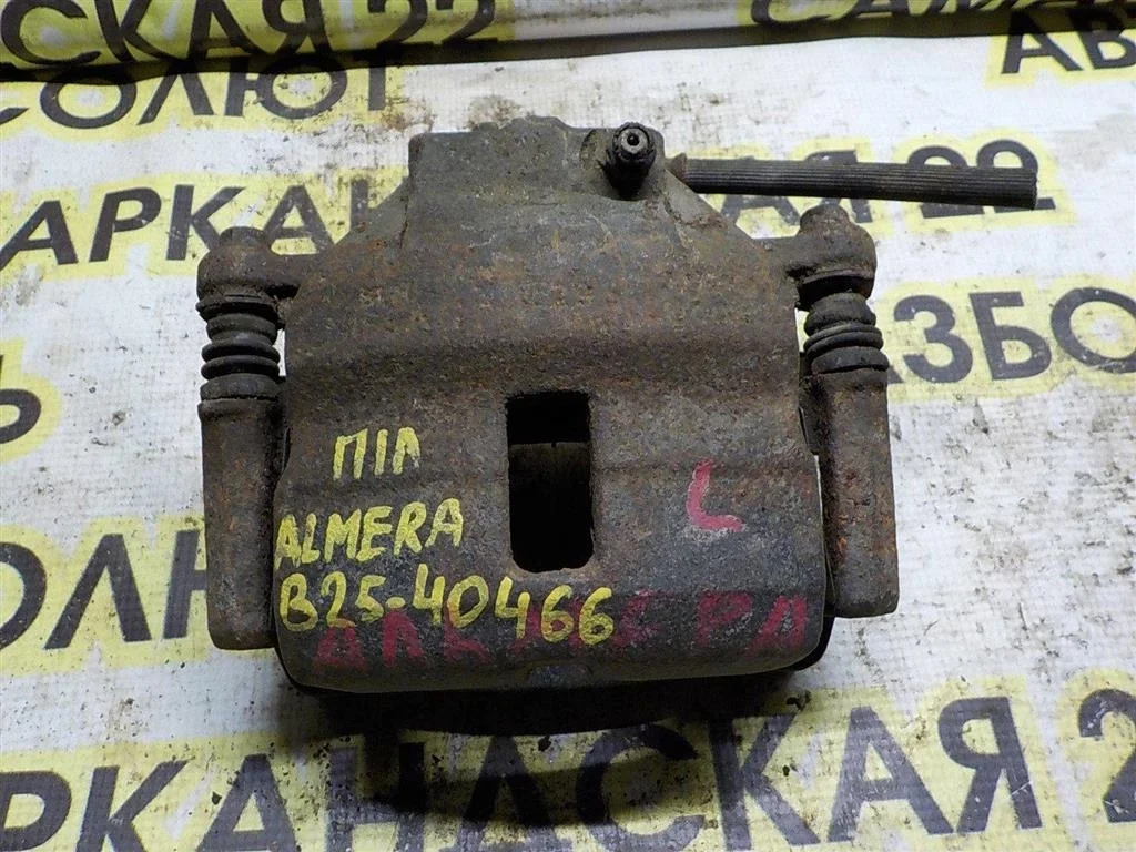 Суппорт передний левый Nissan Almera N16 (2000—2003)