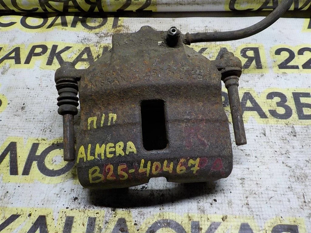 Суппорт передний левый Nissan Almera N16 (2000—2003)