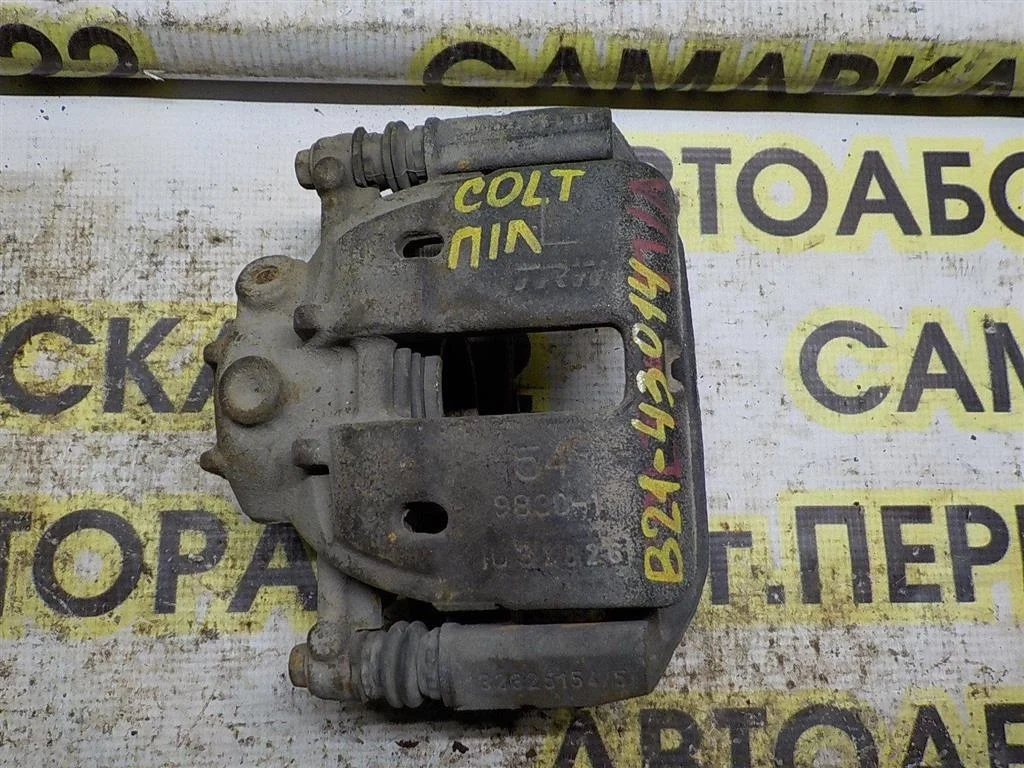 Суппорт передний левый Mitsubishi Colt Z30 (2002—2012)