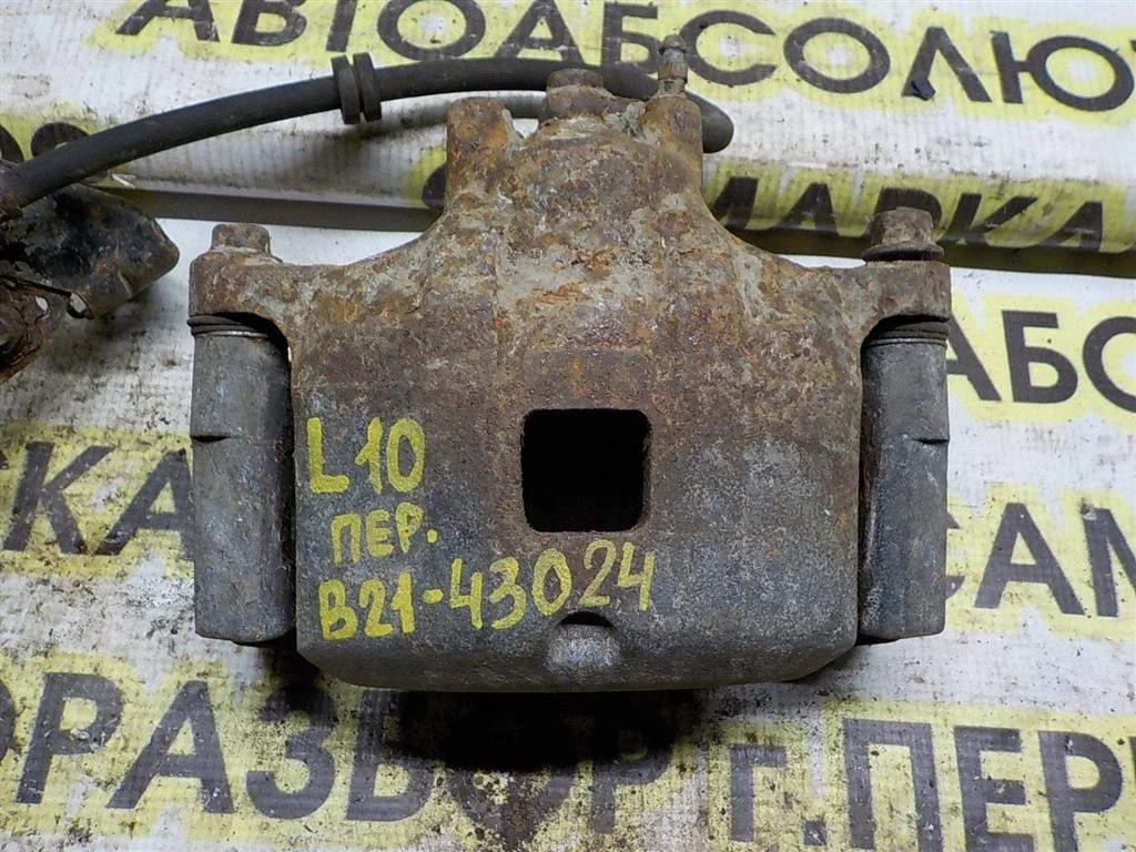 Суппорт передний левый Mitsubishi Lancer X (2007—2010)