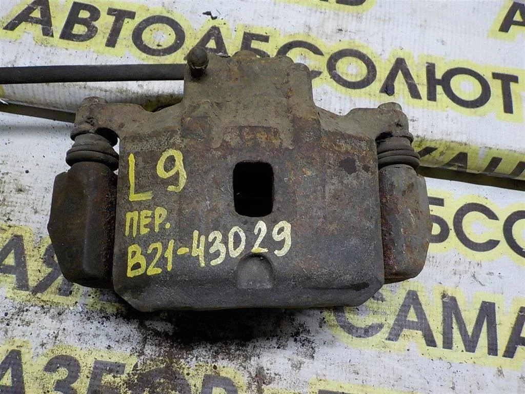 Суппорт передний правый Mitsubishi Lancer IX (2000—2007)