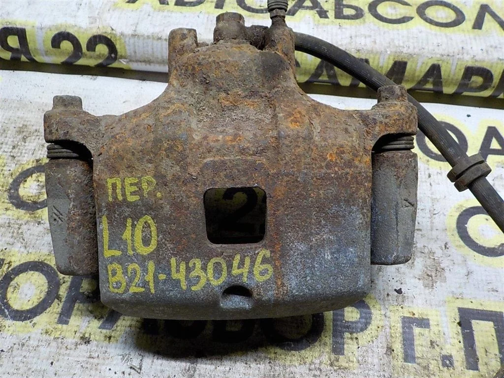 Суппорт передний левый Mitsubishi Lancer X (2007—2010)