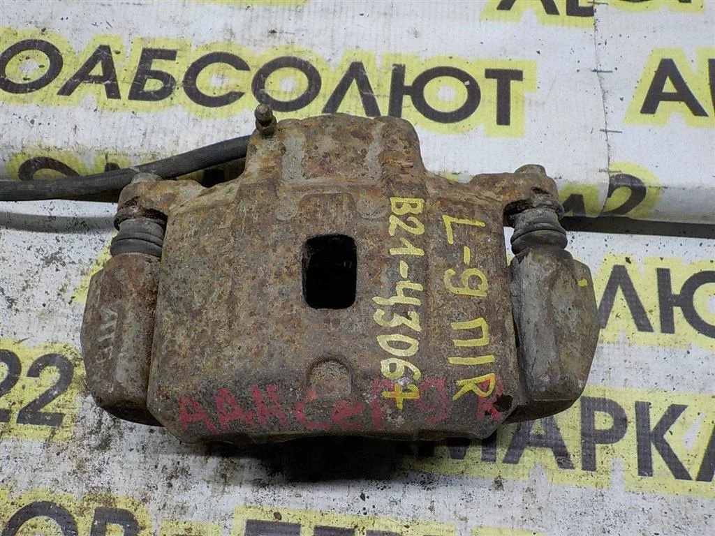 Суппорт передний правый Mitsubishi Lancer IX (2000—2007)