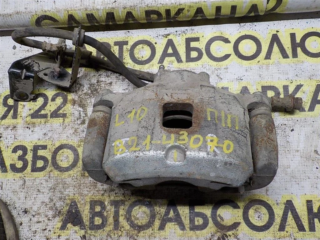 Суппорт передний правый Mitsubishi Lancer X (2007—2010)