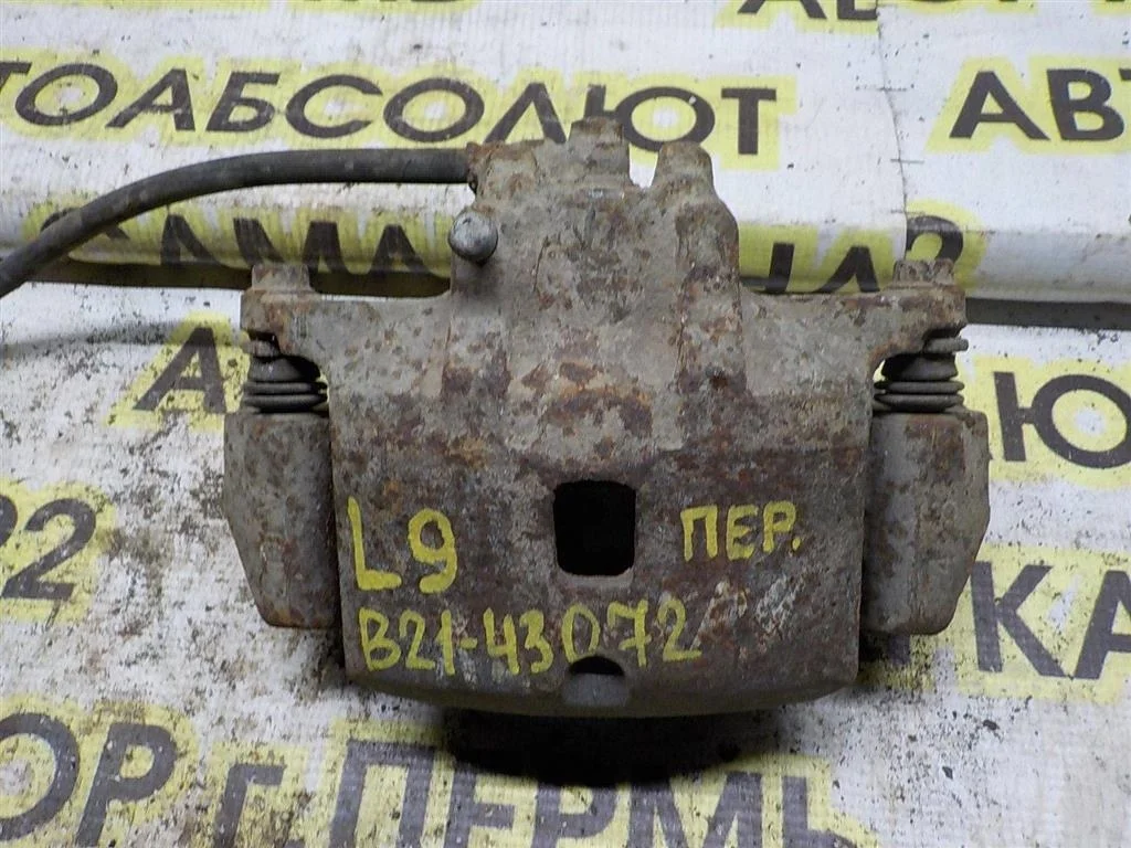 Суппорт передний правый Mitsubishi Lancer IX (2000—2007)