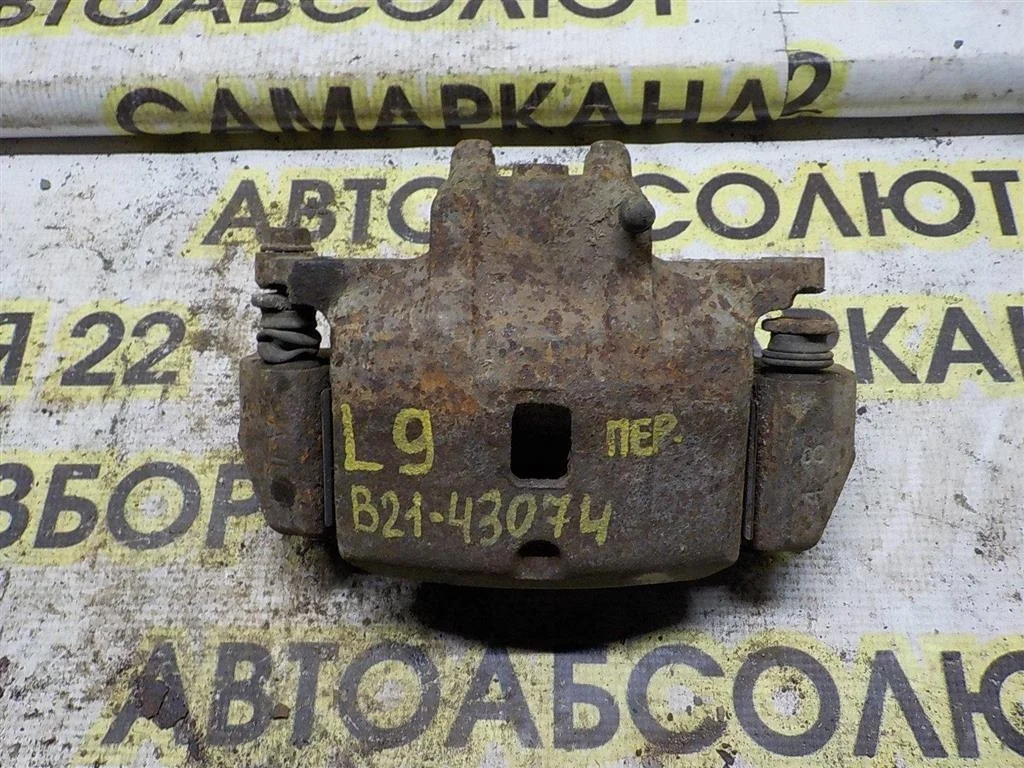 Суппорт передний правый Mitsubishi Lancer IX (2000—2007)