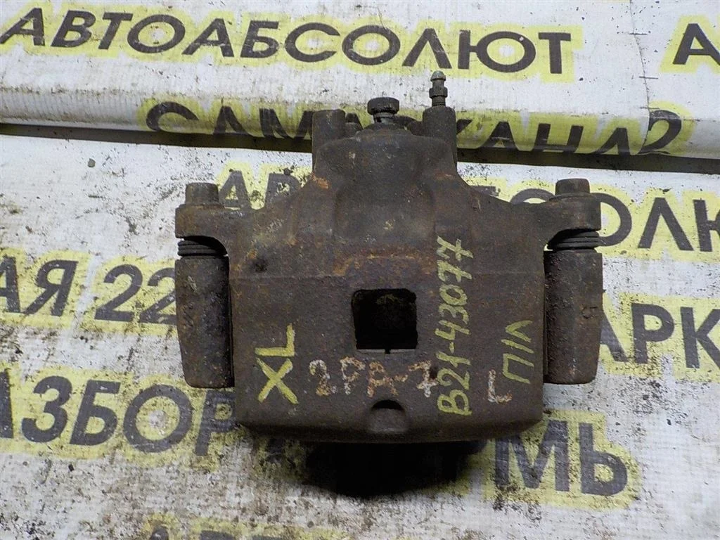 Суппорт передний левый Mitsubishi Outlander I (2002—2009)