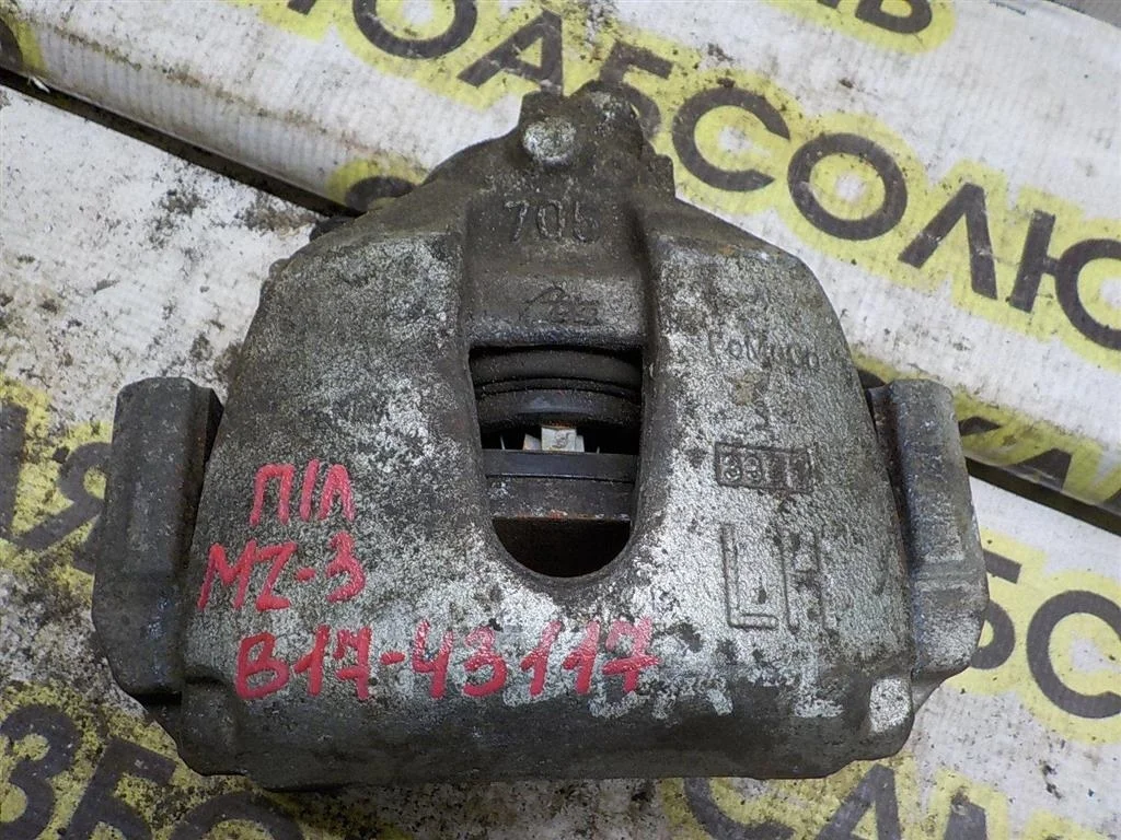 Суппорт передний левый Mazda 3 BK (2003—2006)