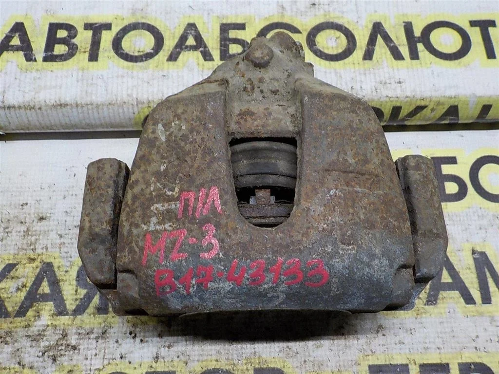 Суппорт передний левый Mazda 3 BK (2003—2006)