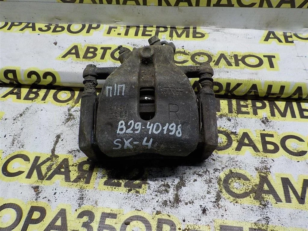 Суппорт передний правый Suzuki SX4 I (2006—2009)