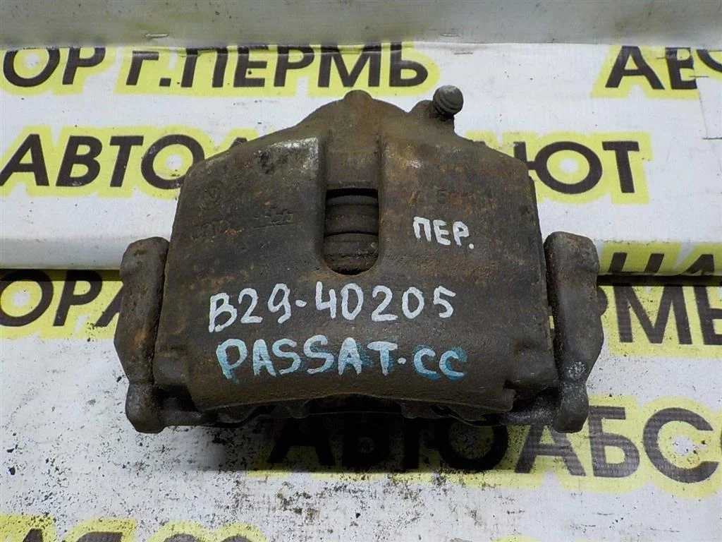 Суппорт передний левый Volkswagen Passat CC B6 (2008—2012)