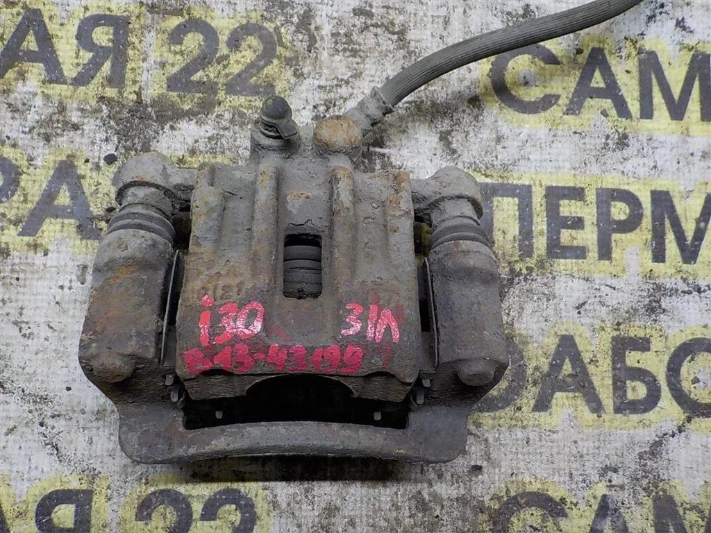 Суппорт задний левый Hyundai i30 I (2007—2010)