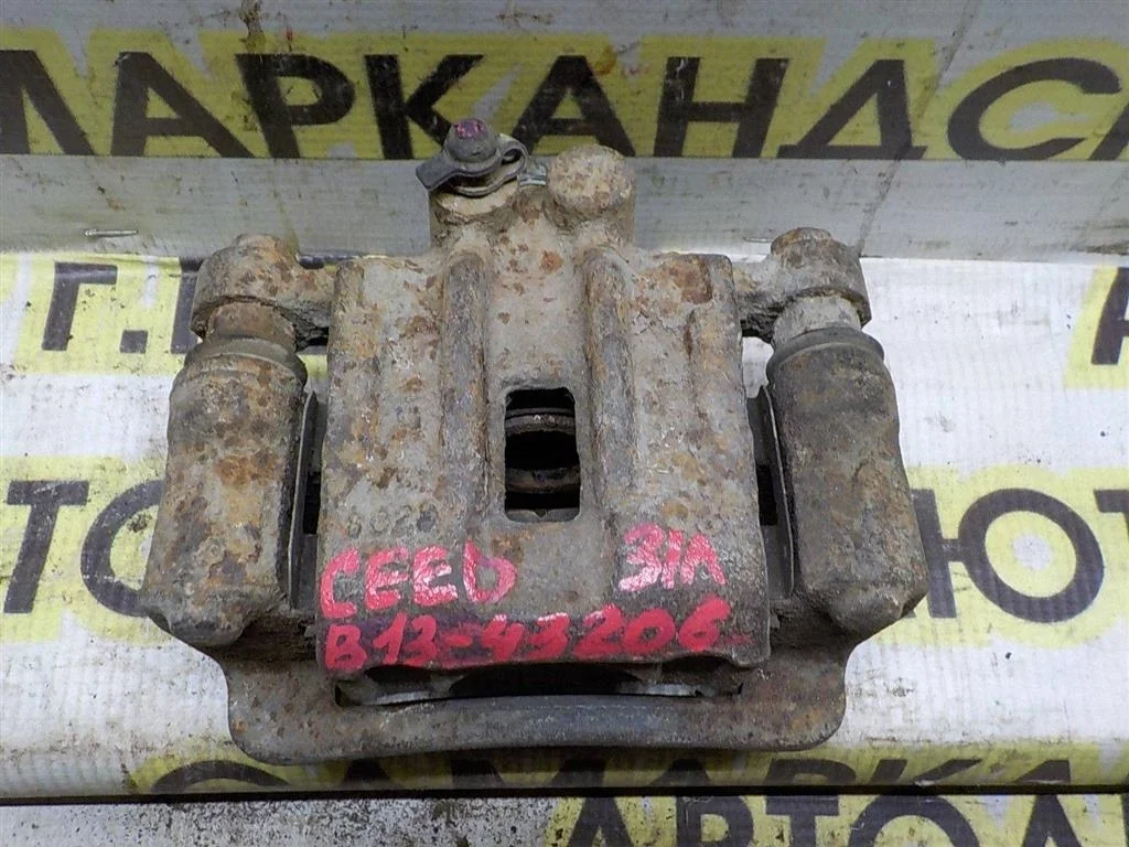 Суппорт задний левый KIA Ceed ED (2006—2010)