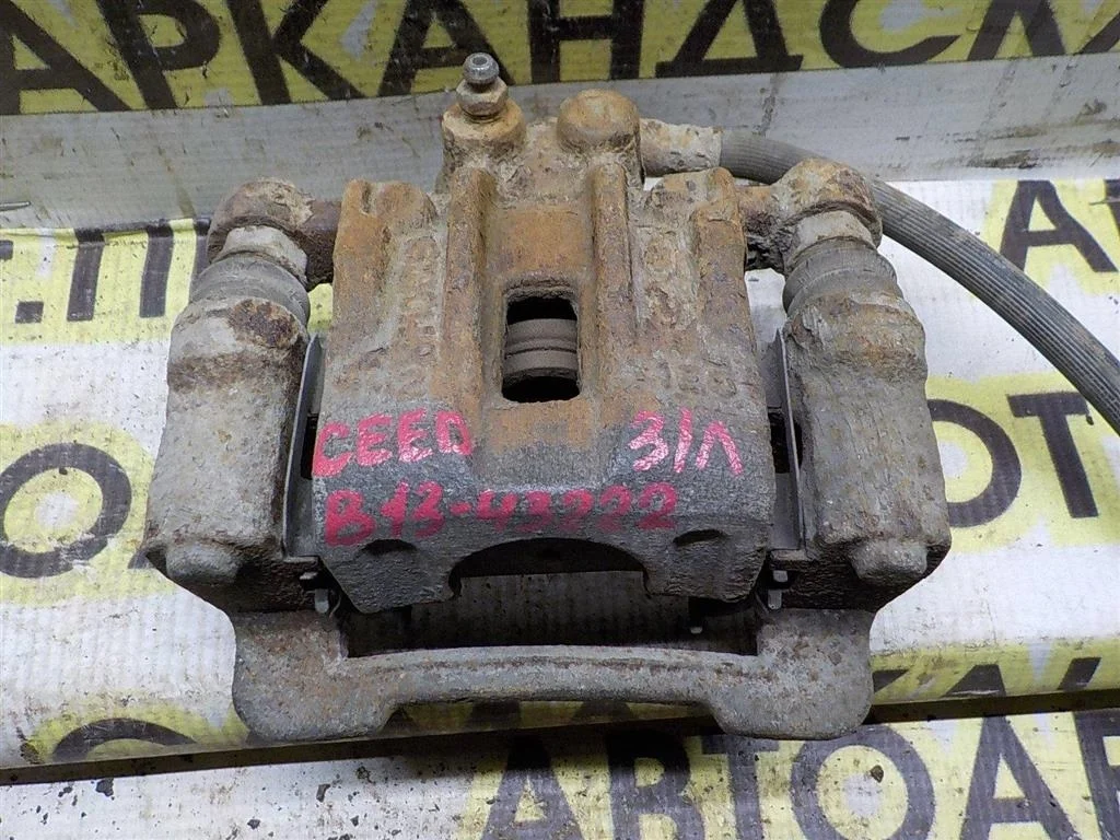 Суппорт задний левый KIA Ceed ED (2006—2010)