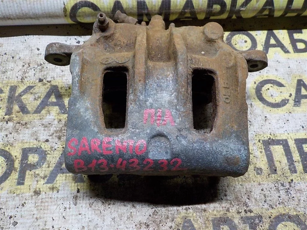 Суппорт передний левый KIA Sorento I (2002—2006)