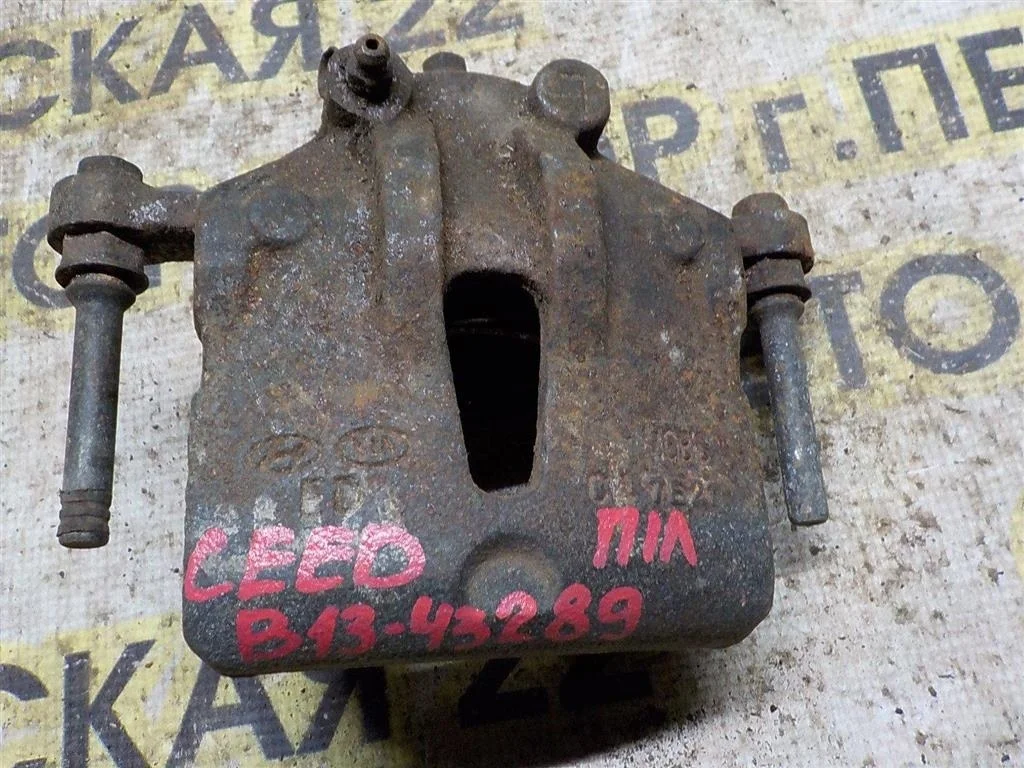 Суппорт передний левый KIA Ceed ED (2006—2010)