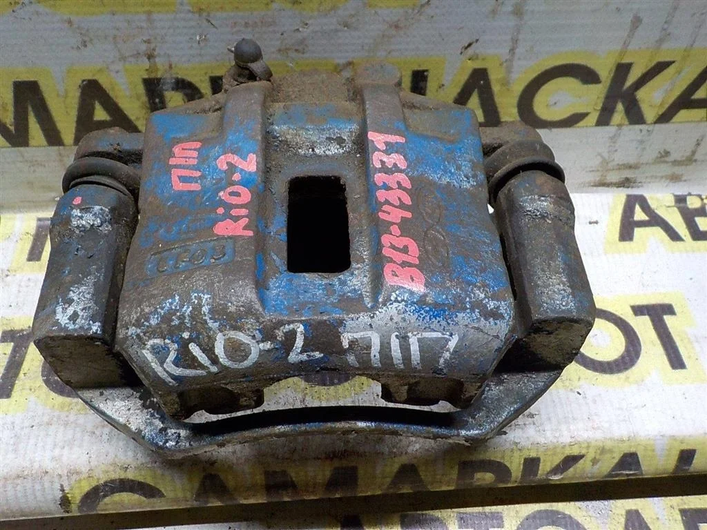 Суппорт передний правый KIA RIO II (2005—2009)