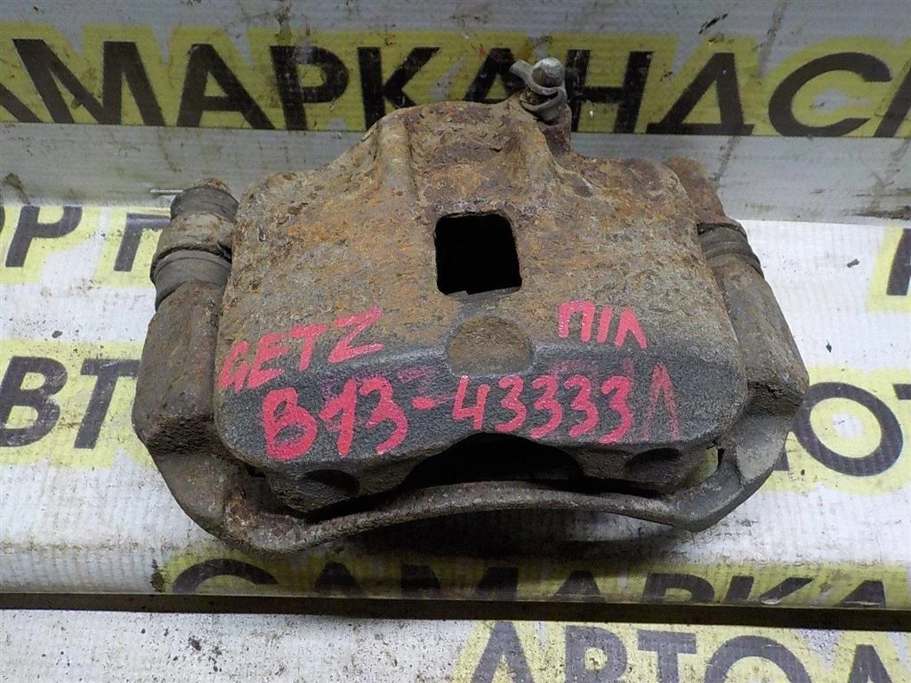 Суппорт передний левый Hyundai Getz I рестайлинг (2005—2011)