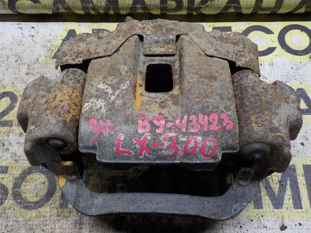 Суппорт задний левый Lexus LX J100 (1998—2002)