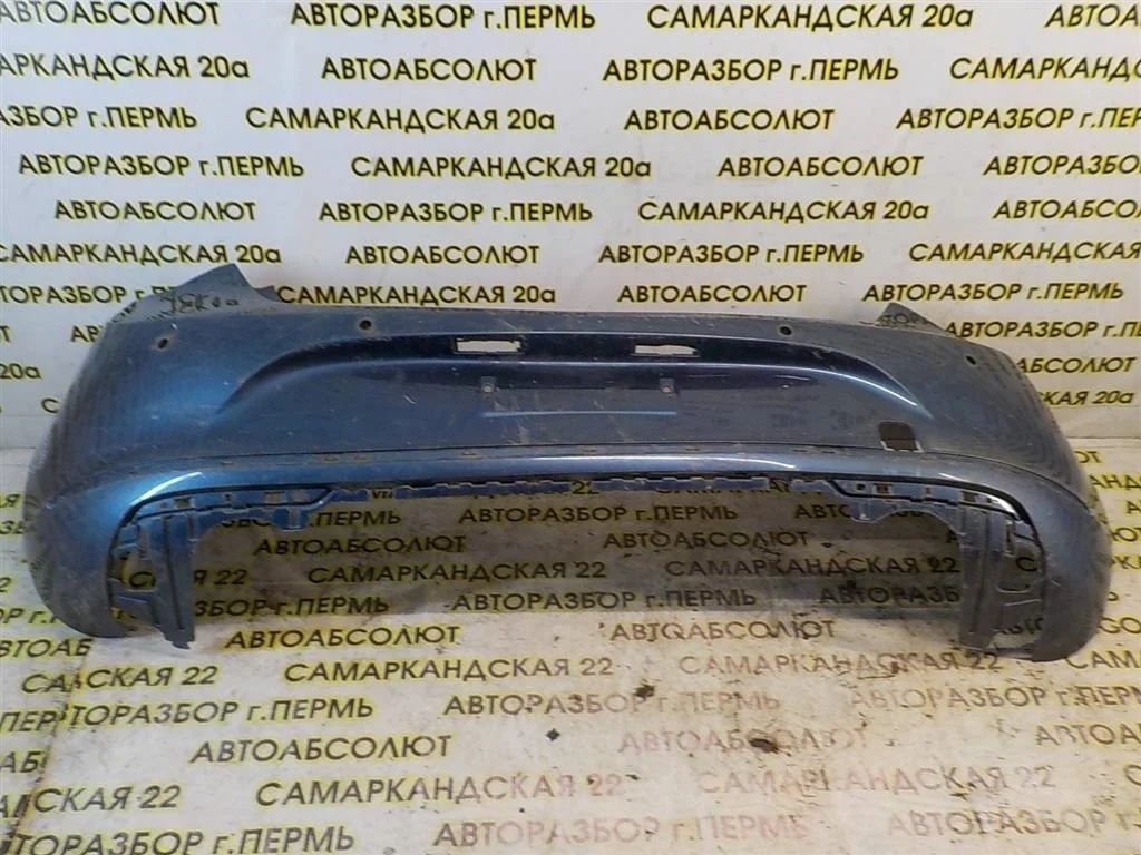 Бампер задний Opel Astra J (2009—2012)